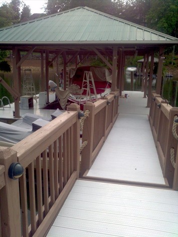 Freshly painted boat house and dock.