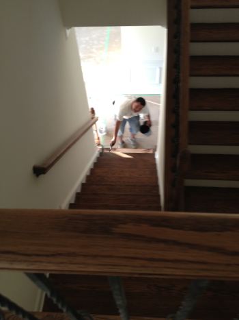 Wood Staining of the stairs in NC by Zelaya Jr Painting